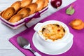 French onion gratin soup in a white pot, close-up Royalty Free Stock Photo