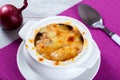 French onion gratin soup in a white pot, close-up Royalty Free Stock Photo