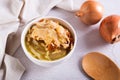 French onion soup with baked cheese bread in a bowl on the table Royalty Free Stock Photo