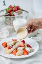 French pancakes with strawberry filling and fresh strawberries. Royalty Free Stock Photo