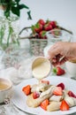 French pancakes with strawberry filling and fresh strawberries. Royalty Free Stock Photo