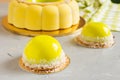 French pastry with yellow mirror glaze