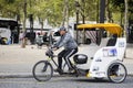 French people biking bicycle rickshaw waiting travelers use service Royalty Free Stock Photo