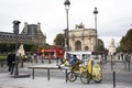 French people biking bicycle rickshaw waiting travelers use service tour around paris Royalty Free Stock Photo