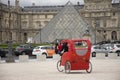 French people biking bicycle rickshaw waiting travelers use service tour around paris Royalty Free Stock Photo