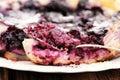 French pie clafoutis with cherry and spoon in white plate Royalty Free Stock Photo
