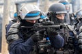 French police using a LBD 40 mm blast ball riot gun during a protest in Paris, France