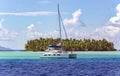 Lonely catamaran in a beautiful turquoise lagoon near the Bora Bora island