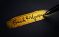 French Polynesia Handwriting Text on Golden Paint Brush Stroke