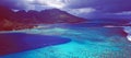 French Polynesia: Helicopter flight over the lagoon of Moorea Island Royalty Free Stock Photo