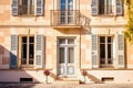 french provincial house with a symmetric facade
