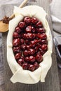 French puff pastry with cherries before baking