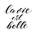 French quote La vie est Belle meaning Life is beautiful.