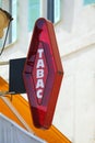 French Red And White Modern Tabac Sign By Day Royalty Free Stock Photo