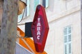 French Red And White Modern Tabac Sign - Close Up View
