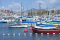 French Riviera Nice Port harbour with colourful boats and super yachts