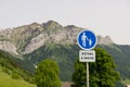 French road sign caution children over mountains pedestrians on the right
