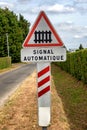 French road sign railway crossing ahead automatic signal