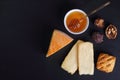 French Saint-Nectaire cheese on slate plate