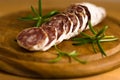 French salami with rosemary Royalty Free Stock Photo