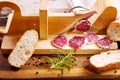 French salami with rosemary and bread Royalty Free Stock Photo