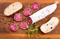 French salami with rosemary and bread Royalty Free Stock Photo