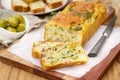 French savoury cake with olives, zucchini, ham and cheese Royalty Free Stock Photo