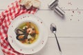 French seafood soup with white fish, shrimps and mussels in plat