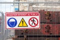 French sign on a fence stating Do not enter construction site