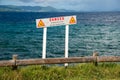 French sign warning people to keep away from a dangerous cliff Royalty Free Stock Photo