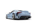 French sky blue modern super sports car - back view