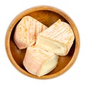 French soft cheese triangles, Saint Albray, in a wooden bowl Royalty Free Stock Photo