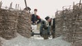 French soldiers prepare the cannon for the shot