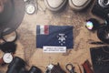 French Southern Flag Between Traveler`s Accessories on Old Vintage Map. Overhead Shot