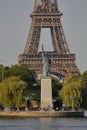 French Statue of Liberty Replica and Eiffel Tower, view from the River Seine - Paris, France, AUGUST 1, 2015 - was given to Citize