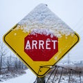 French Stop sign covered with snow Royalty Free Stock Photo