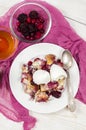 French toast casserole with berries and vanilla ice cream on white wooden background Royalty Free Stock Photo