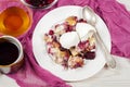 French toast casserole with berries and vanilla ice cream on white wooden background Royalty Free Stock Photo