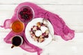 French toast casserole with berries and vanilla ice cream on white wooden background Royalty Free Stock Photo