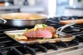 french toast on a skillet, mid-cooking process