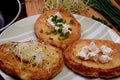 French toasts with goats cheese, fresh chives and sprouts.