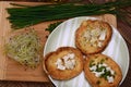 French toasts with goats cheese, fresh chives and sprouts.