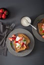 French toasts with yogurt and strawberries for breakfast Royalty Free Stock Photo