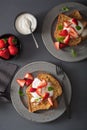 French toasts with yogurt and strawberries for breakfast Royalty Free Stock Photo