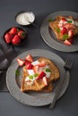 French toasts with yogurt and strawberries for breakfast Royalty Free Stock Photo