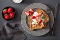 French toasts with yogurt and strawberries for breakfast Royalty Free Stock Photo