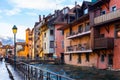 French town of Annecy with pastel houses along Thiou river on winter