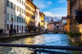 French town of Annecy with pastel houses along Thiou river on winter