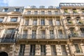 French traditional architecture, wall and windows of the French buildings on the streets of Paris, France