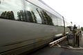 French train passing through unmanned level crossing, chenonceau, loire valley, france